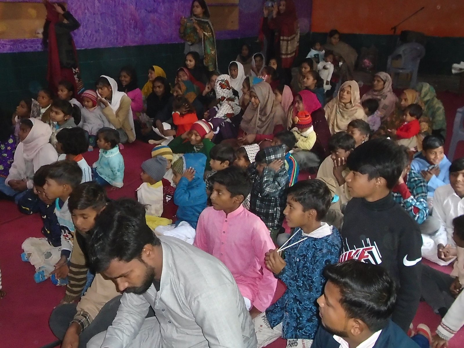 children-listenting-to-the-stories-of-Christ