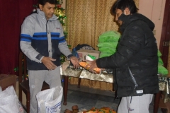 Paster-Pervaiz-and-brother-Joseph-creating-bags-to-give-away2