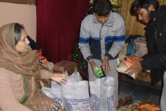 Sister-Shasteen-Paster-Pervaiz-and-brother-Joseph-creating-bags-to-give-away2